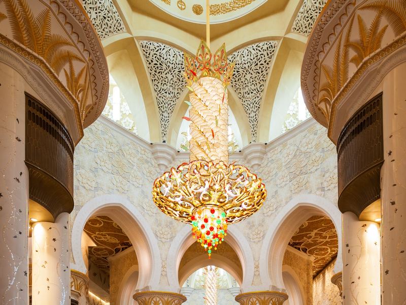 Interior of Sheikh Zayed Grand Mosque's main prayer hall with chandelier