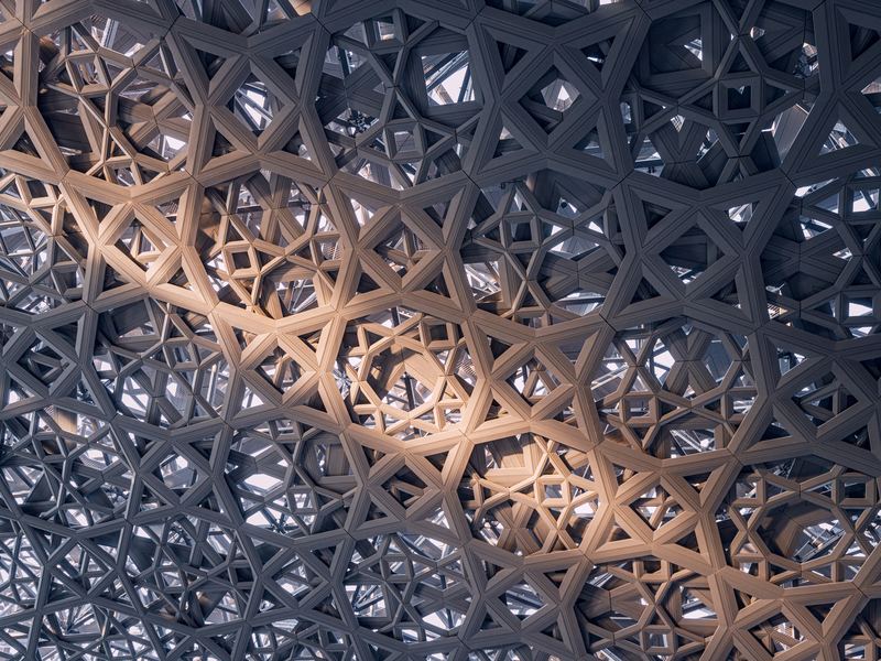 Detail of the geometric lattice dome at Louvre Abu Dhabi